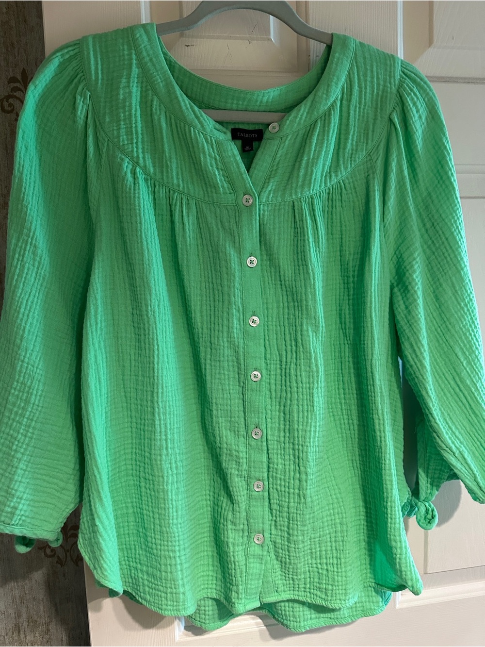 Talbots green gauze blouse with tie on sleeves. Coverage but cool,in hot weather